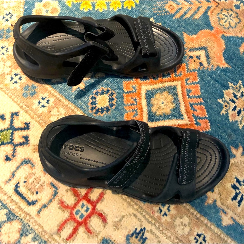 Iconic Crocs Men’s foam sandals never worn. Perfect boat/beach shoes.